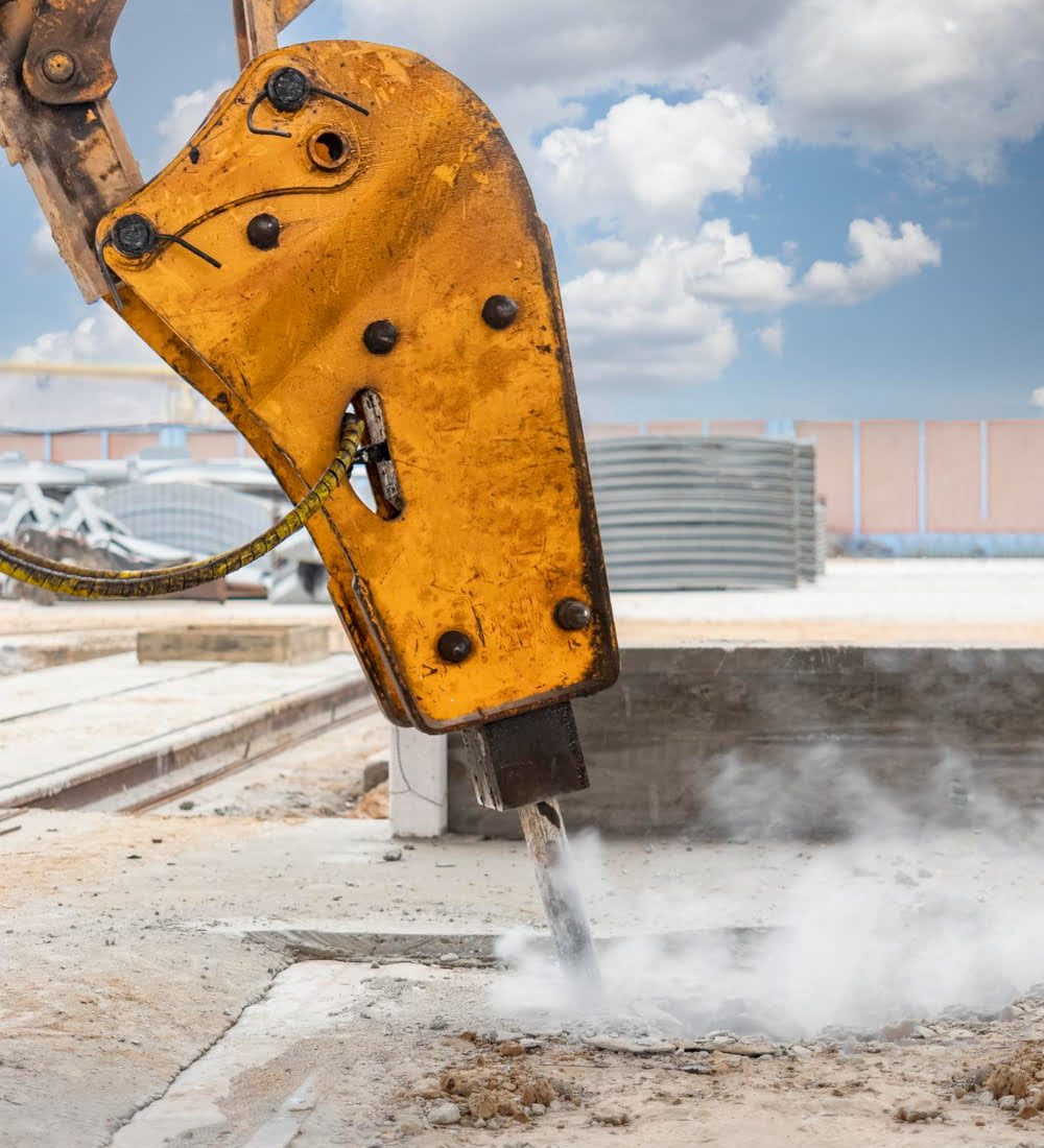 professional-demolition-reinforced-concrete-structures-with-industrial-hydraulic-hammer-with-excavator-dismantling-concrete-floor-production-area-debris-crumbs-concrete